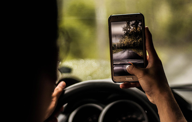 driver looking at phone