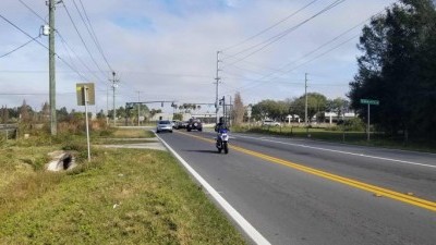 Facing the project intersection from the south side on Waring Road