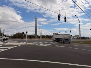 Completed intersection at US 17 and CR 630 facing east, including the new pavement, pedestrian islands and signals and new crosswalks.