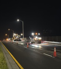 Crews pave with a paving machine and roller over the US 17 Bridge in Winter Haven on 3/26/2026