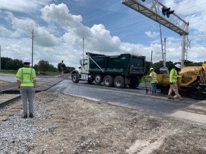 Roadway paving leading up to the tracks was completed August 3