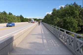 A 12-foot-wide multi-use path extends along the south side of the new bridge. The new bridge railing shown here will mimic the historic design of the railing on the John Singletary Bridge.