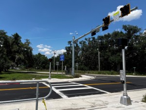 A new Pedestrian Hybrid Beacon (PHB) was installed on US 98 at Edgewood Drive to facilitate safe crossing for those using the new trail which now connects to the trail extending to Fort Meade High School/Fort Meade Park.  PHBs allow walkers to press the button to stop traffic in order to cross safely.
